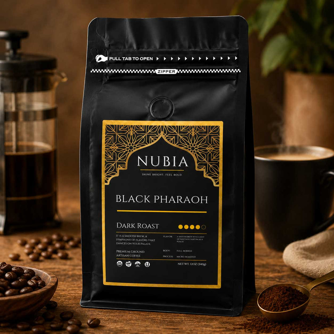 Nubia Black Pharaoh Coffee on Table with coffee cup & beans