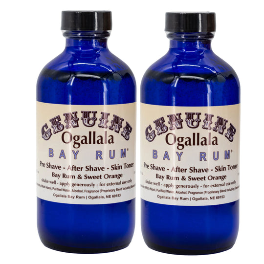 Two bottles of Ogallala Bay Rum on a white background