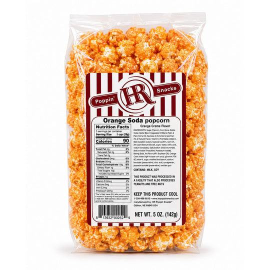 A 5 oz bag of orange soda popcorn from H&R Snacks, showing the front nutrition label and the bright orange popcorn inside a clear plastic bag on a white background.