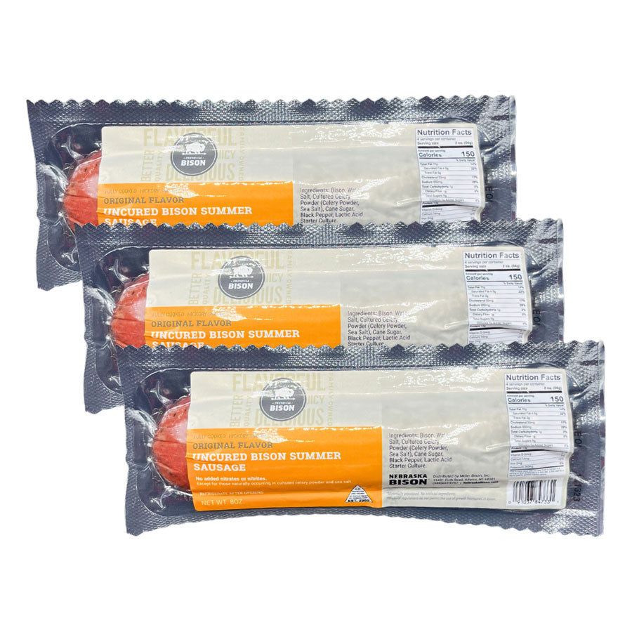 Three packages of Bizon Summer Sausage on a white background