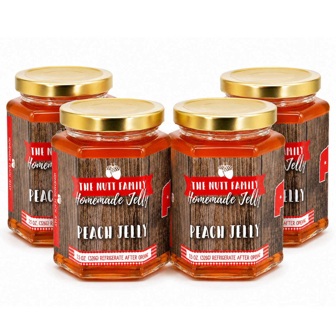 Four jars of Peach Jelly with wooden effect labels on a white background
