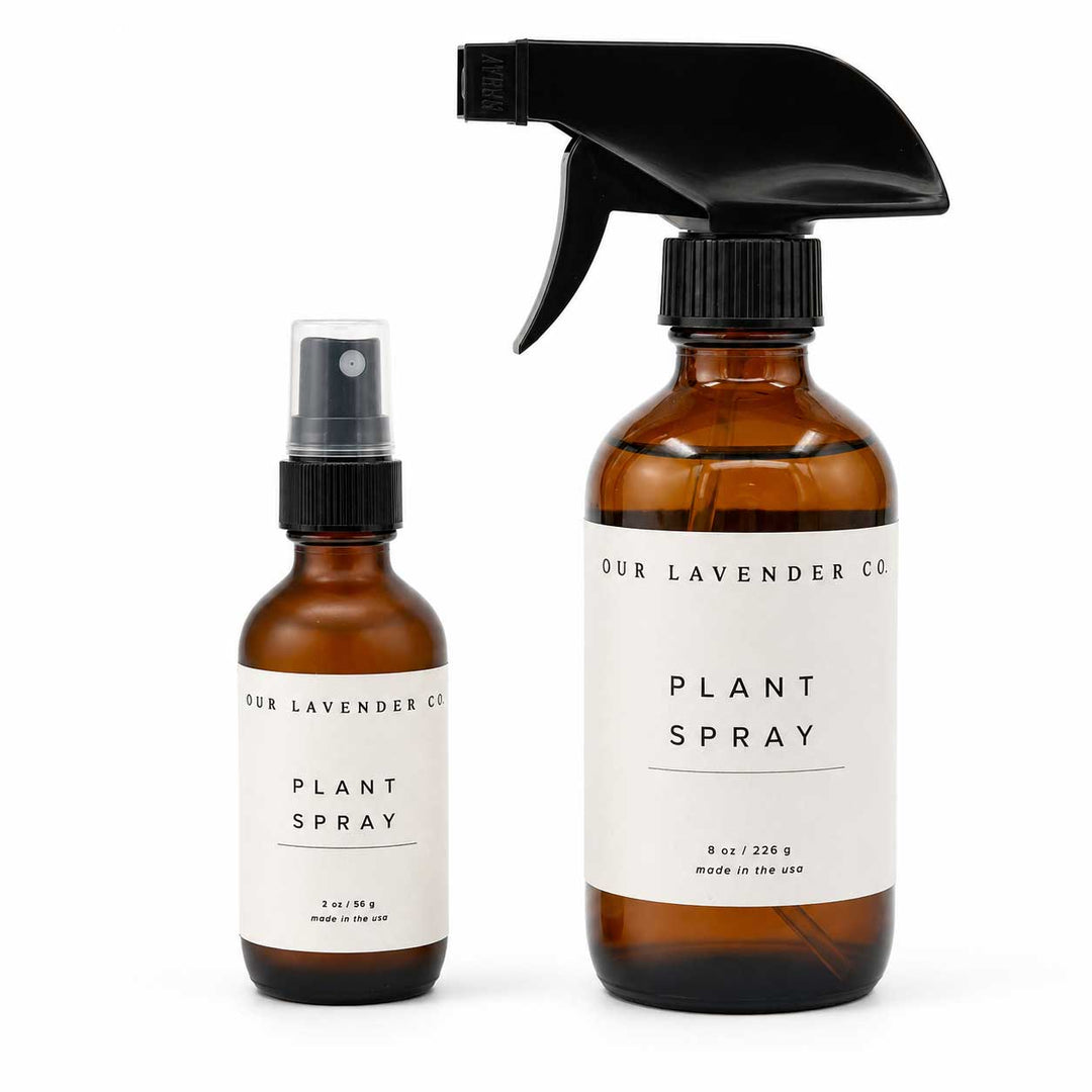 Two brown spray bottles with labels on a white background