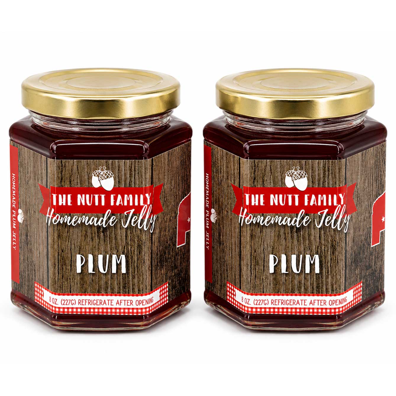 Two jars of The Nutt Family Homemade Jelly with plum flavor on a white background