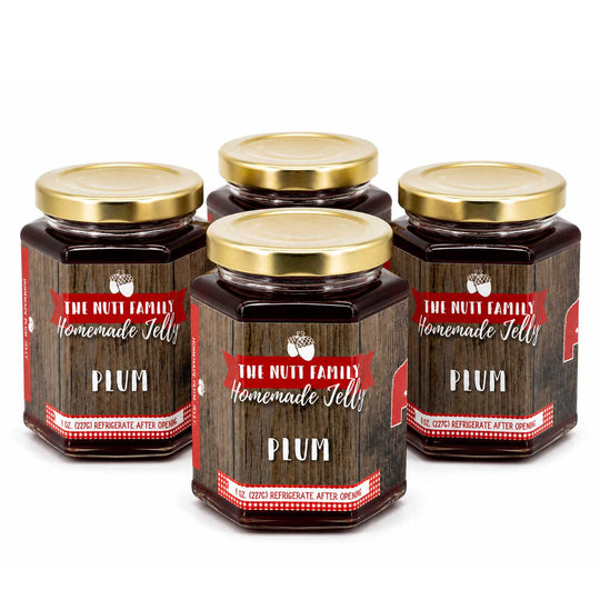 Four jars of Plum Jelly from The Nutt Family Homemade Jelly on a white background