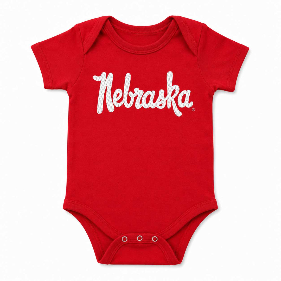 A red short-sleeve baby bodysuit with 'Nebraska' printed in white script across the chest, shown on a plain white background.