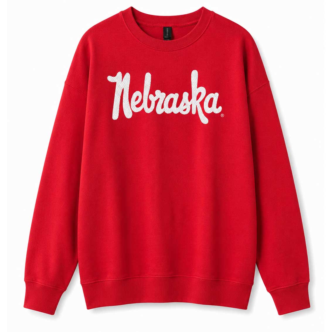 A bright red crewneck sweatshirt featuring the word 'Nebraska' printed across the chest in a white cursive script, displayed against a clean white background.