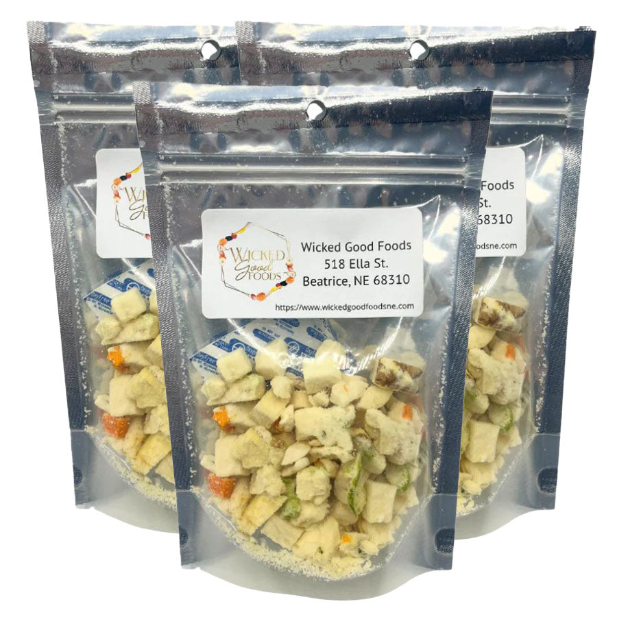 Three packages of Wicked Good Foods potato soup on a white background