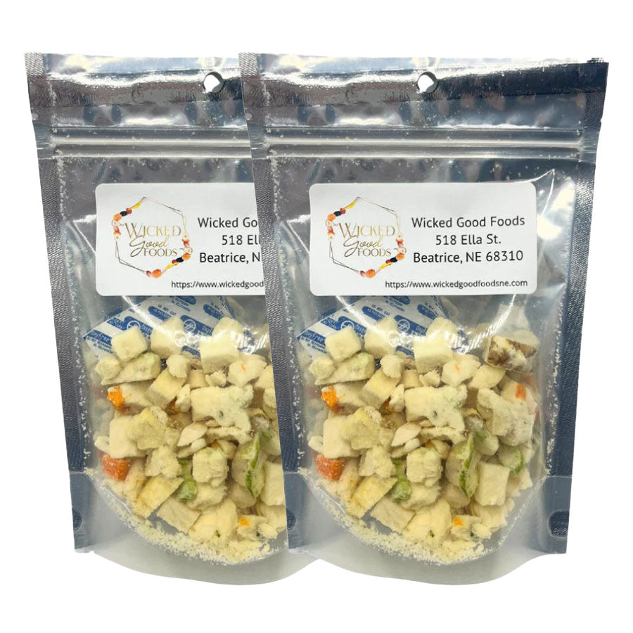 Two packages of Wicked Good Foods soup with visible branding and address label.