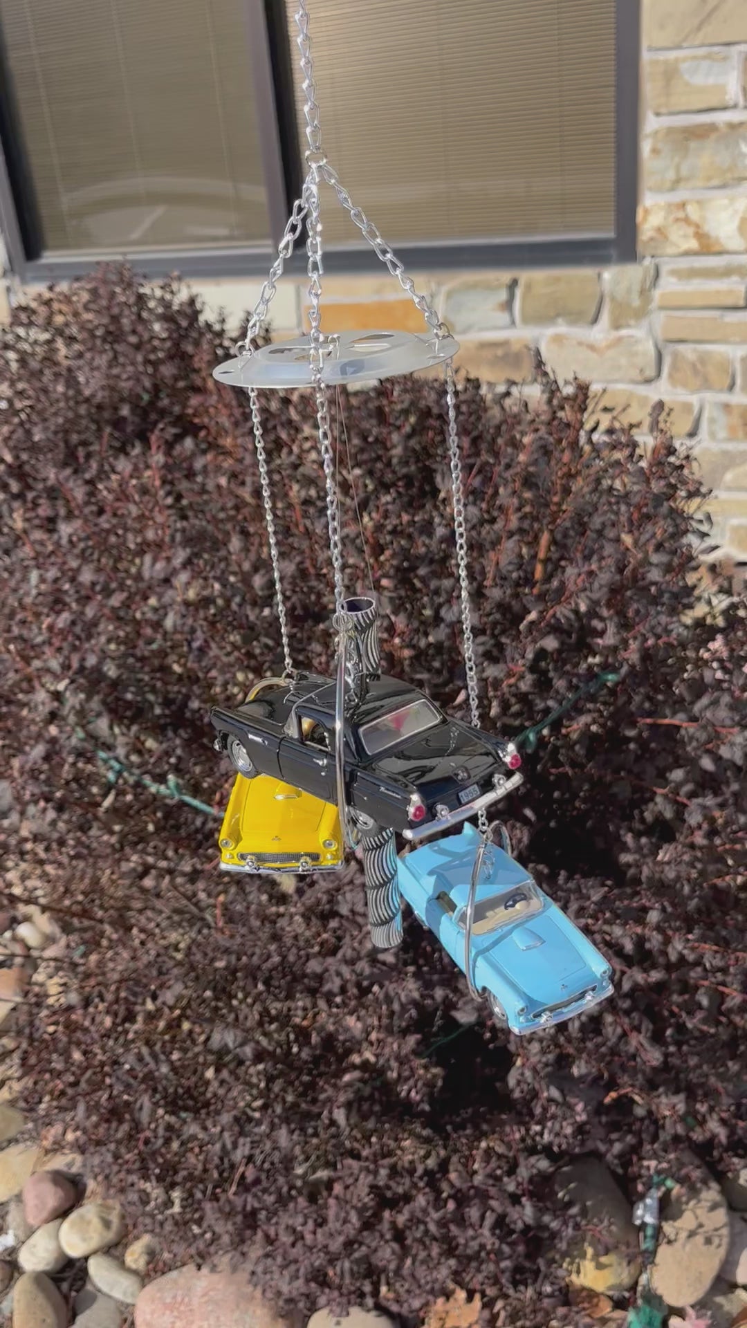 Video of 1955 Thunderbird outside in the wind 