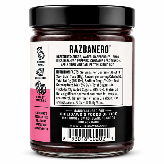 Razbanero pepperoni jam in a clear glass jar with a black lid and a white label featuring a pink side panel, photographed against a black background.