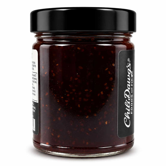 A glass jar of Chili-Doug's Hot Pepper Jam with a black lid and a black label, shown on a white background.