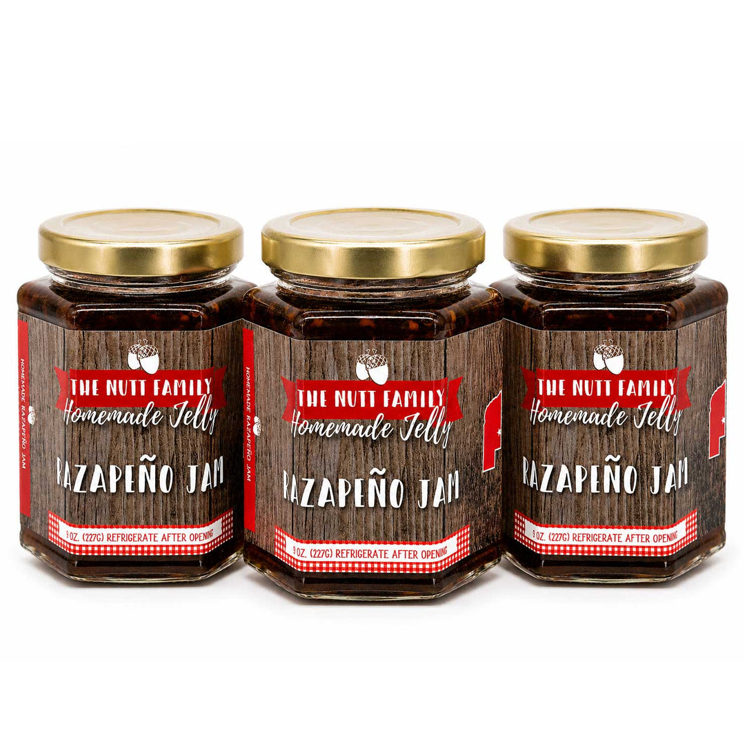 Three jars of 'The Nutt Family' Homemade Jalapeño Jam on a white background