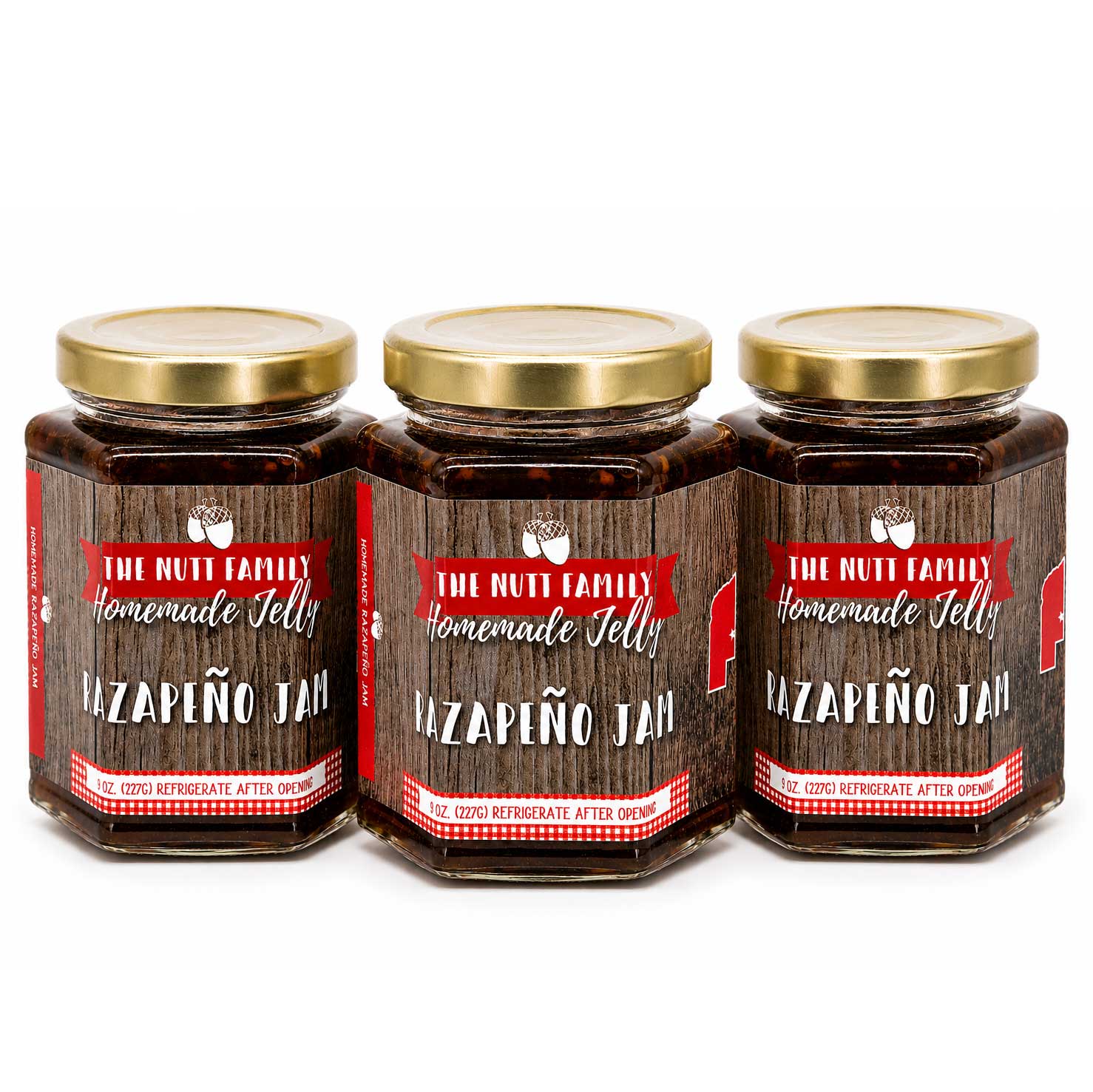 Three jars of 'The Nutt Family' Homemade Jalapeño Jam on a white background