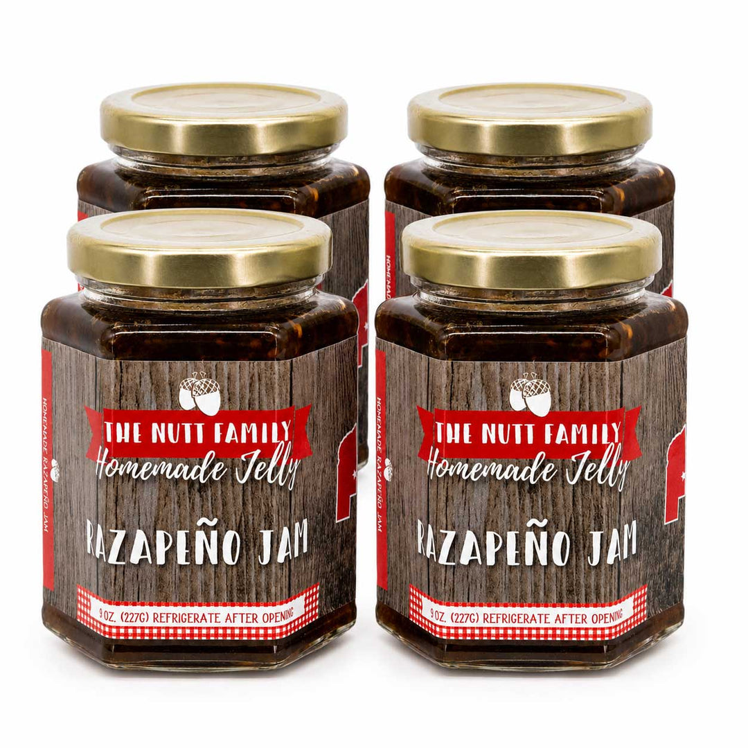 Four jars of Razapeño jelly with wooden label design on a white background