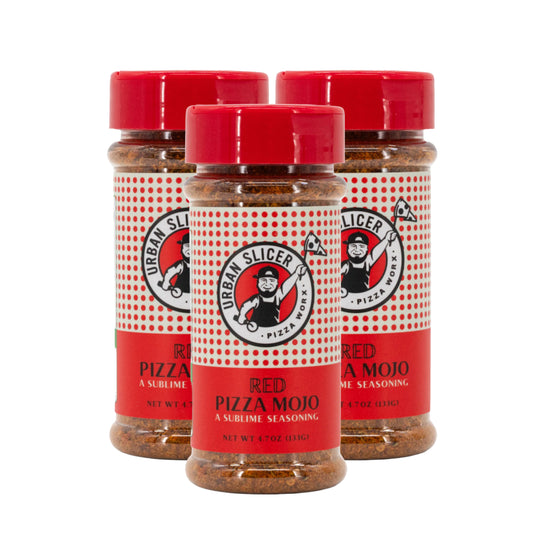 Three bottles of Urban Slicer Pizza Red Pizza Mojo seasoning on a white background