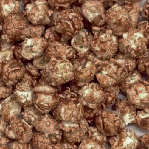 A close-up view of popcorn kernels coated in a glossy, caramel-like glaze, filling the entire frame.