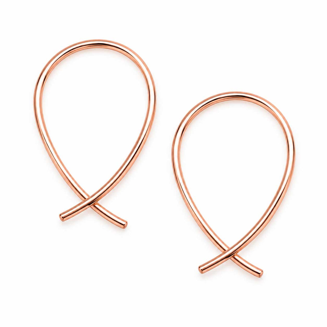 A pair of rose gold wire loop earrings on a clean white background.