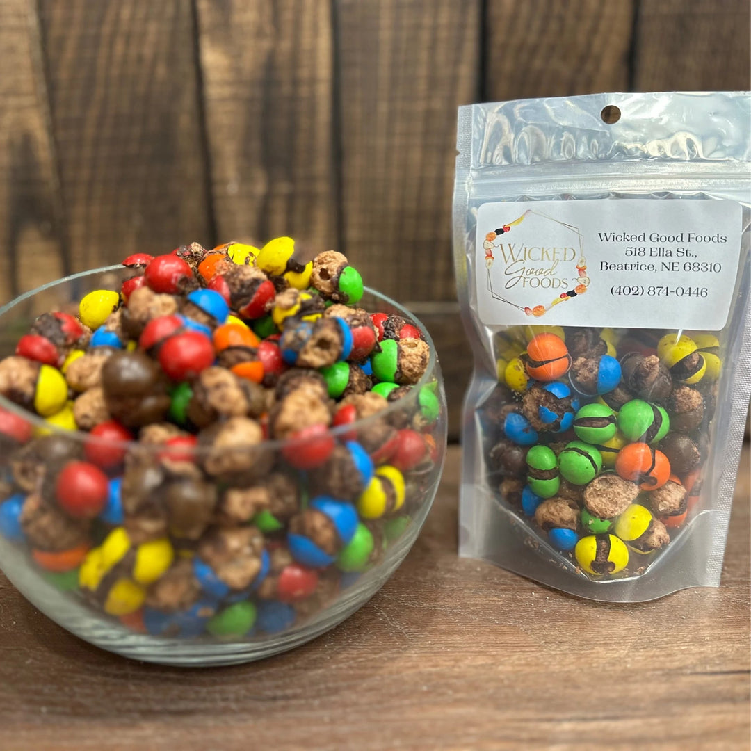 A bowl and bag of freeze dried fudge crunchers with a wood background