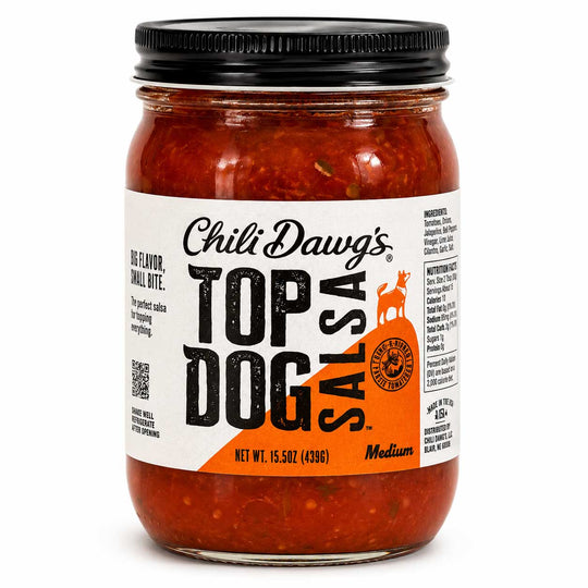 A glass jar of Chili Dawg's Top Dog Salsa, featuring a black metal lid and a white label with orange and black text, set against a plain white background.