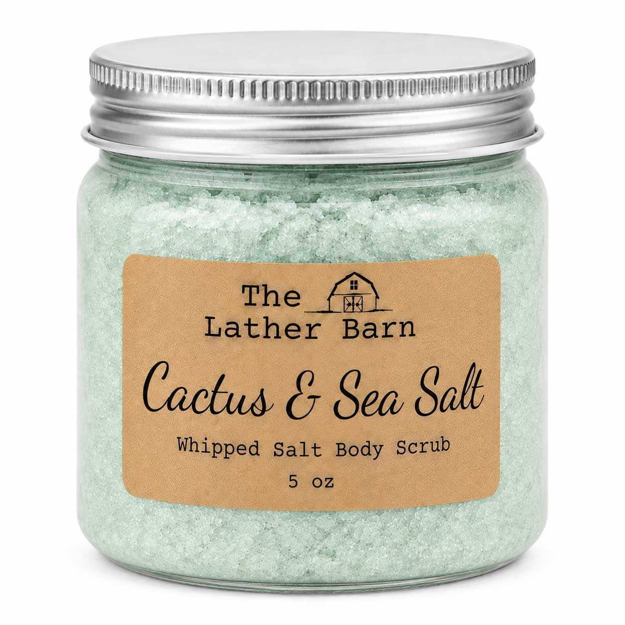 A 5 oz glass jar of The Lather Barn Cactus & Sea Salt Whipped Salt Body Scrub, filled with pale green salt crystals and topped with a silver metal lid, set against a plain white background.