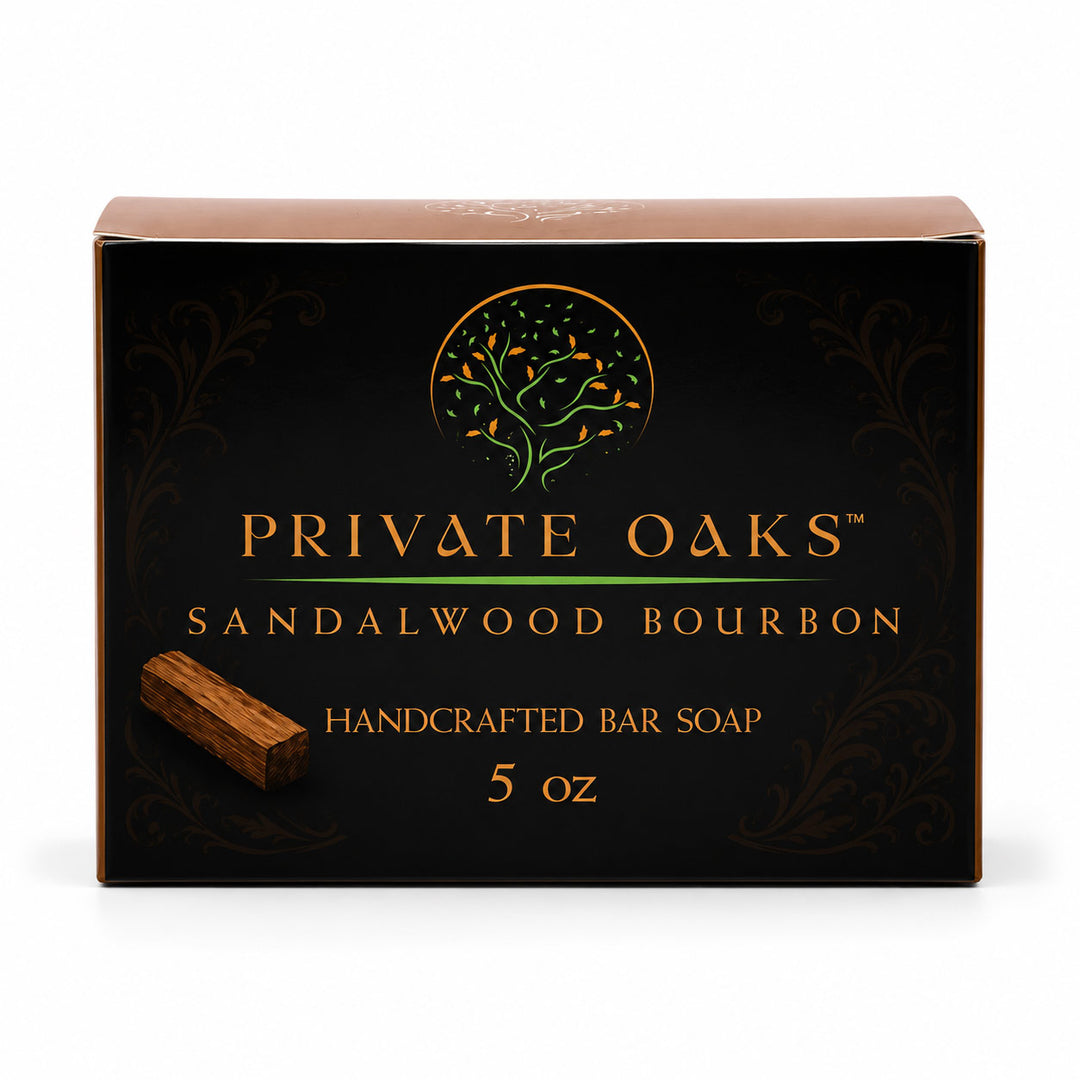 Private Oaks Sandalwood Bourbon handcrafted bar soap in a black rectangular box with gold lettering and a small photo of the wooden bar soap on the front, shown on a white background.
