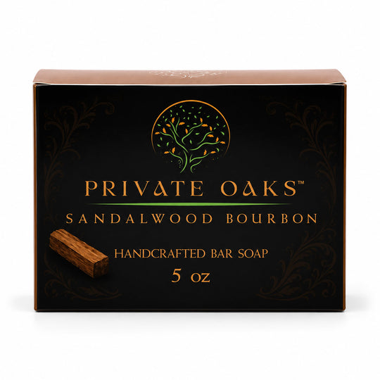 Private Oaks Sandalwood Bourbon handcrafted bar soap in a black rectangular box with gold lettering and a small photo of the wooden bar soap on the front, shown on a white background.