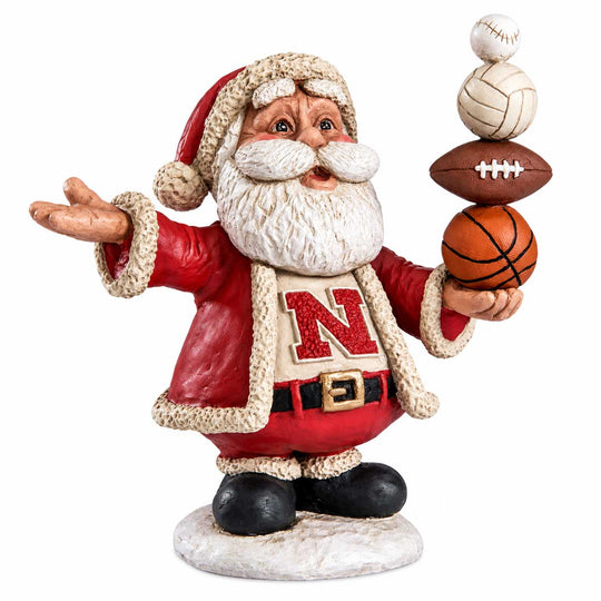 Husker santa holing sports balls