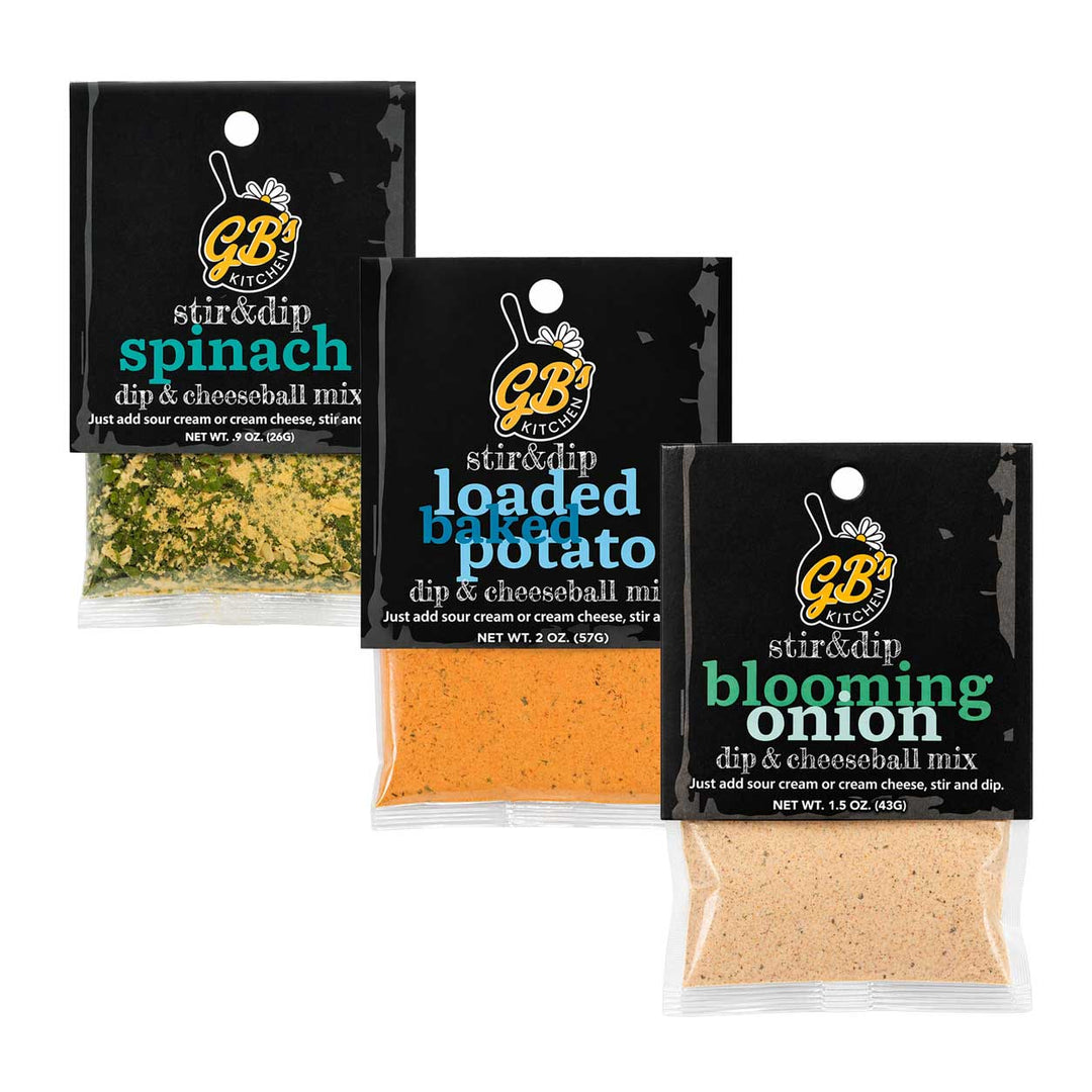 Three packages of GB Kitchen dip and cheeseball mixes on a white background