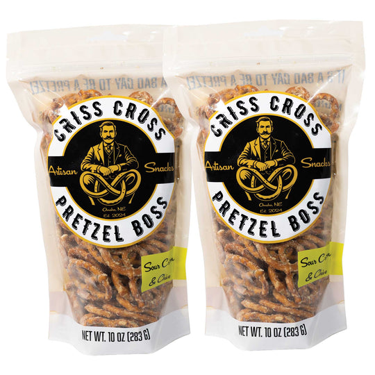 Two packages of Criss Cross Pretzel Boss Sour Cream & Chive Pretzels on a white background
