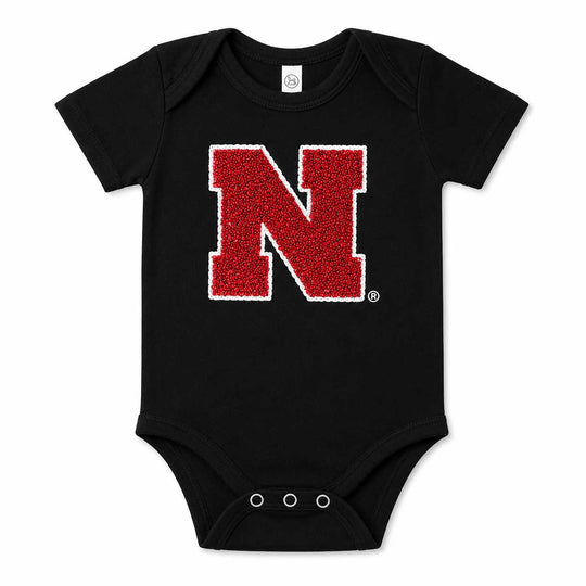 Nebraska Sewn Sequin Appliqué Black Licensed Onesie | Multiple Sizes | H.Flynn Designs