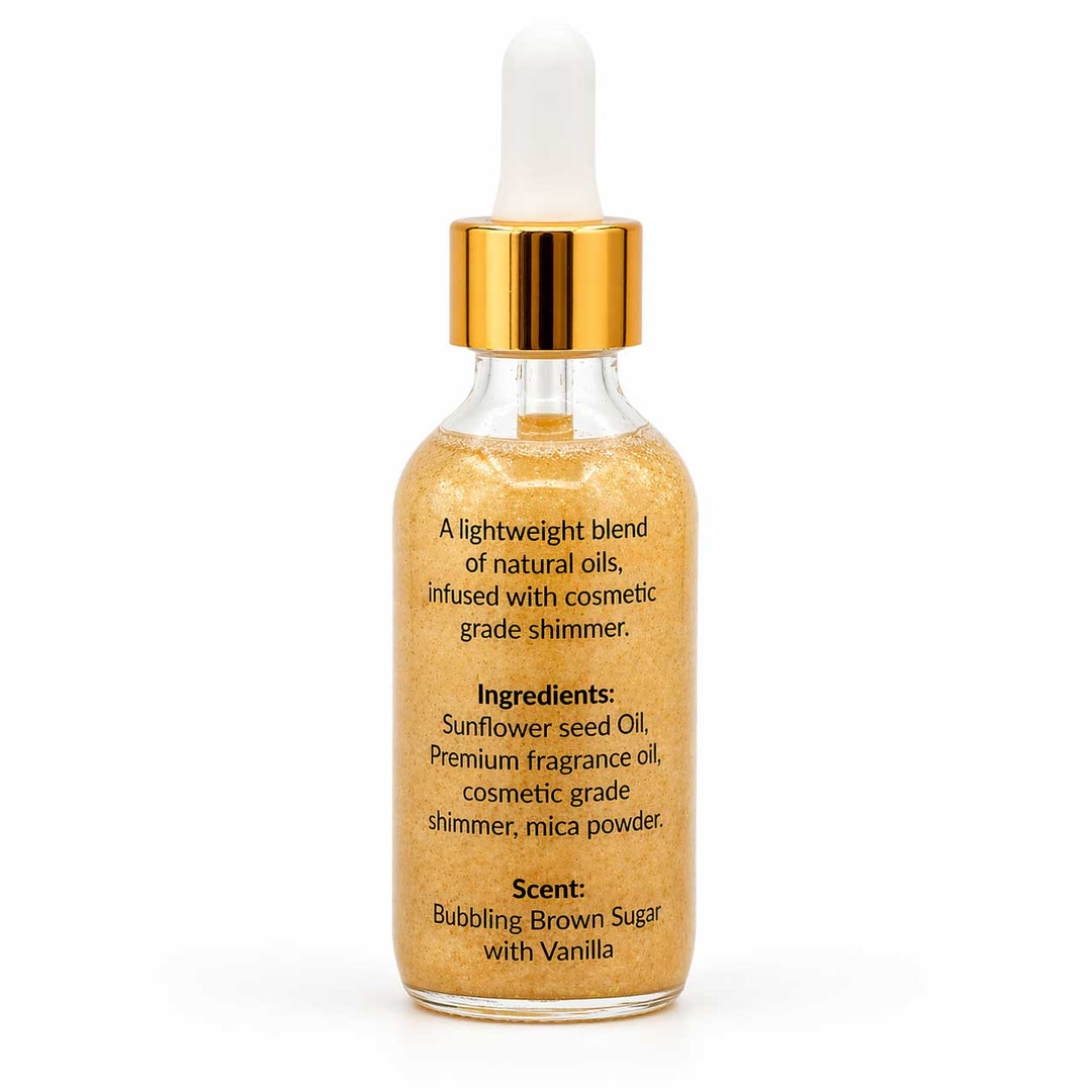 Glass bottle with gold cap and label on a white background