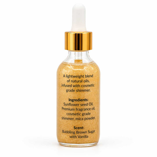 Glass bottle with gold cap and label on a white background