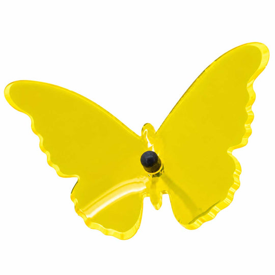 A translucent yellow butterfly-shaped object with a small black circular center, shown on a plain white background.