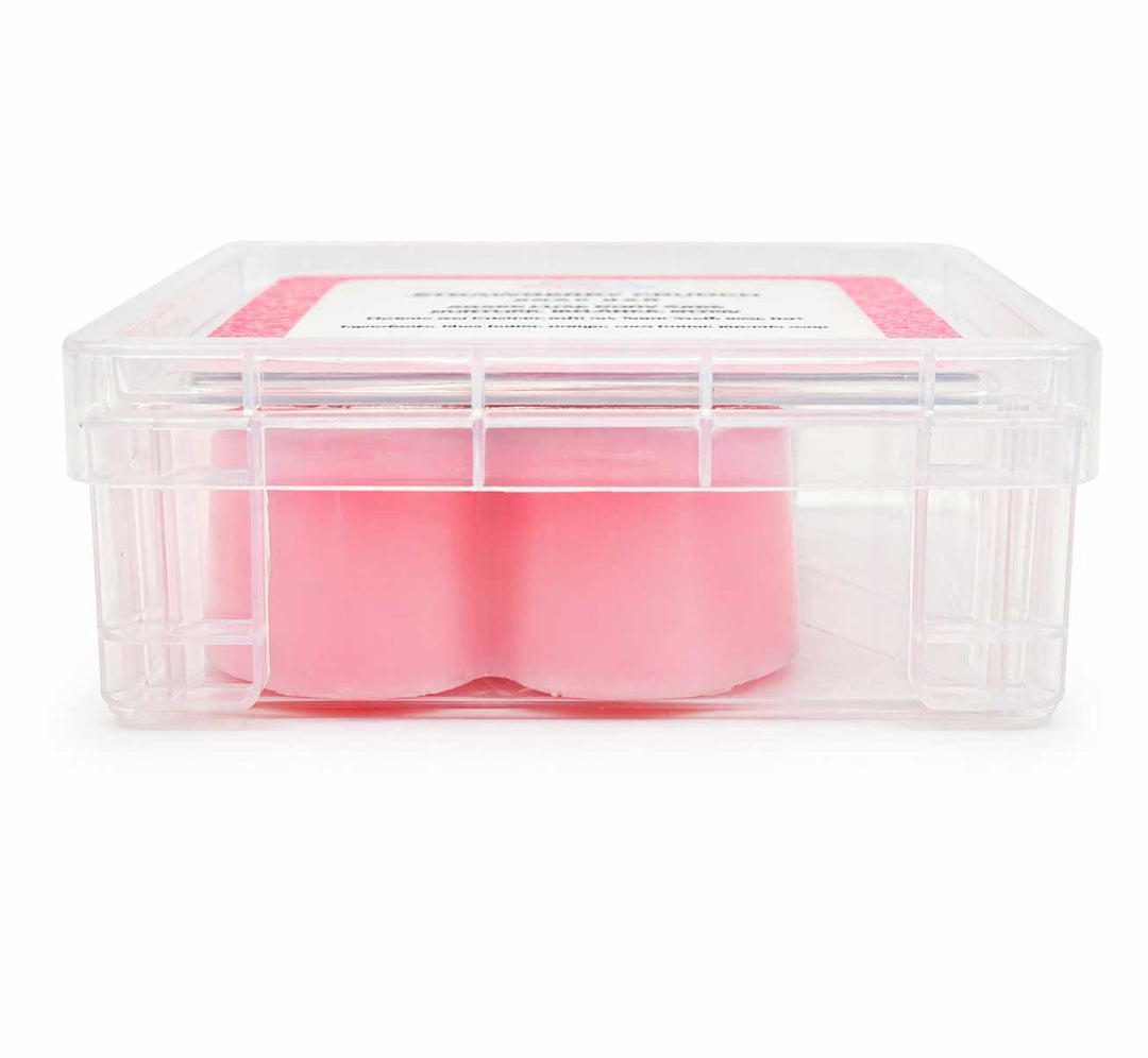Clear container with pink items on a white background