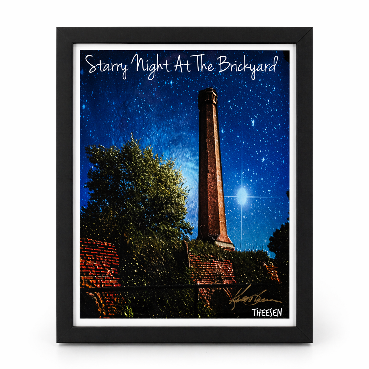 Framed artwork titled 'Starry Night At The Brickyard' featuring a brick tower under a starry sky.