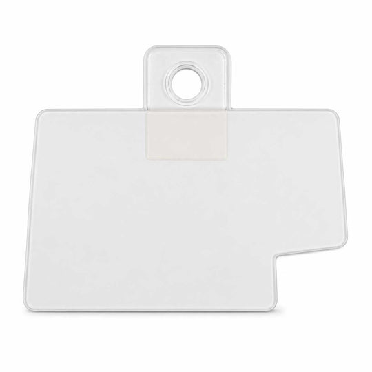 A clear plastic sticker with a rounded rectangular body, a small circular cutout at the top, and a stepped bottom-right corner, shown on a plain white background.