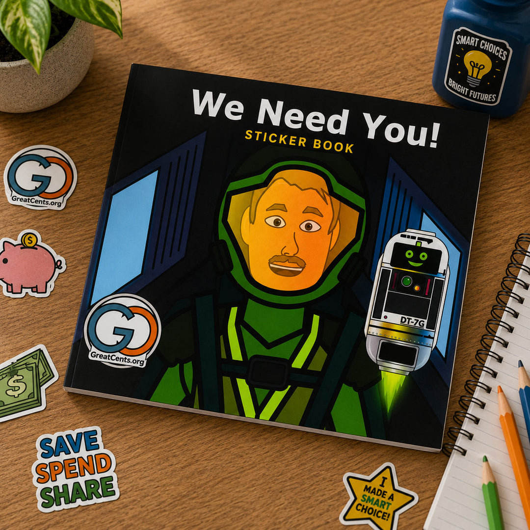 A sticker book titled 'We Need You!' lies on a wooden desk, surrounded by stickers, pencils, a notebook, and a plant. The book cover features an illustrated astronaut in green and black with a robot graphic.