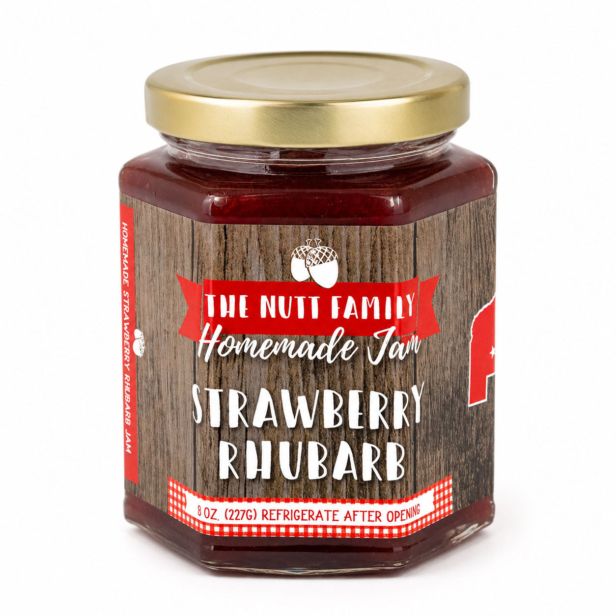 Jar of strawberry rhubarb jam with a wooden label on a white background