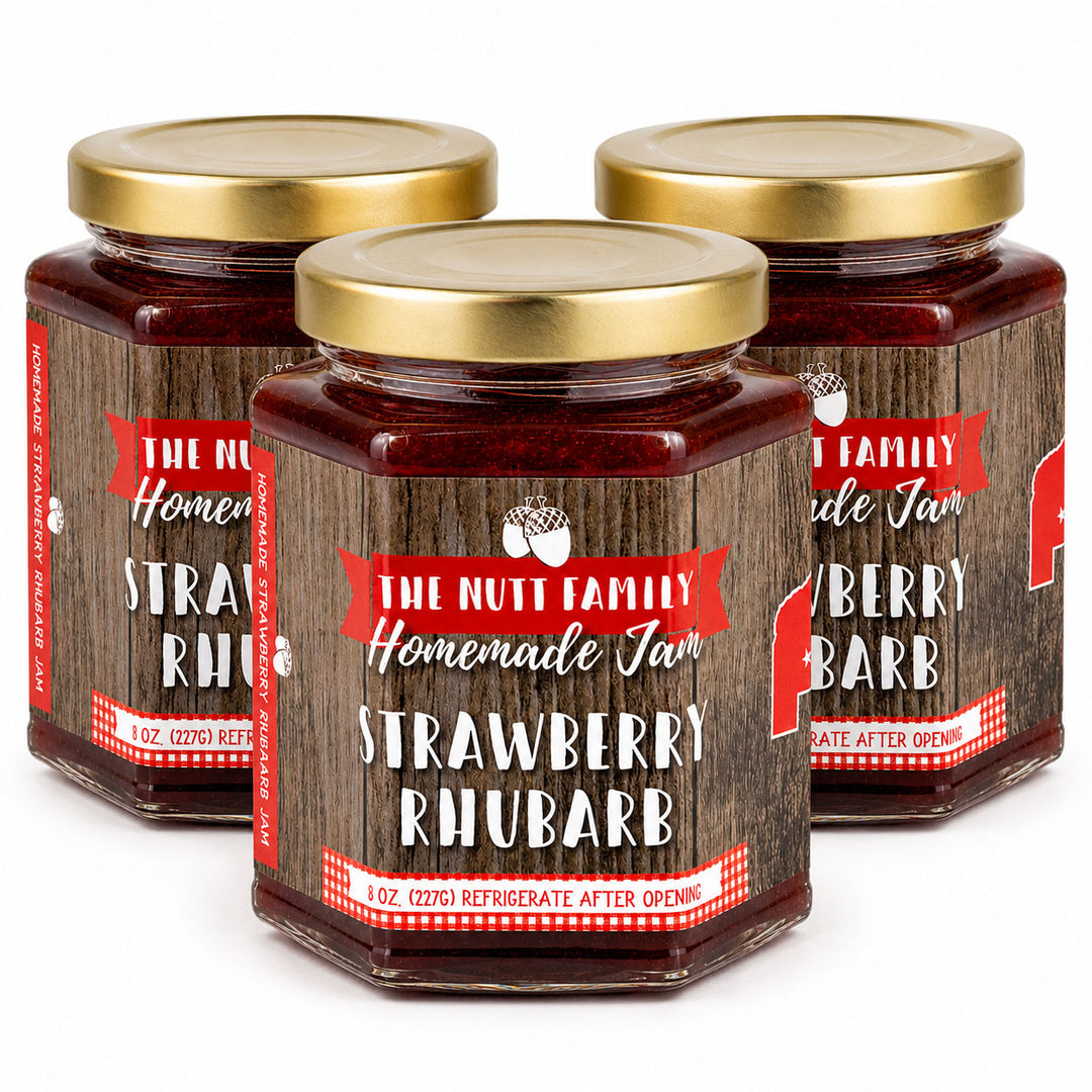 Three jars of Nutt Family Homemade Strawberry Rhubarb Jam on a white background