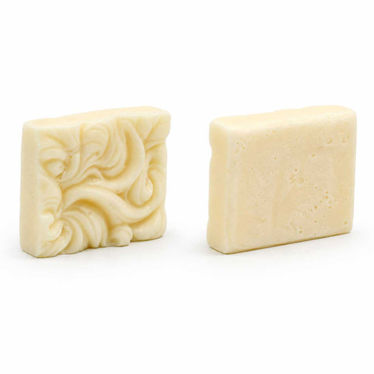 Two bars of soap on a white background
