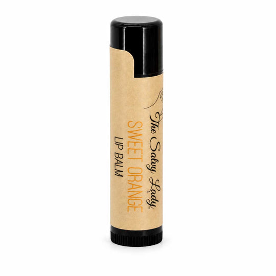 Lip balm with a black cap and beige body on a white background