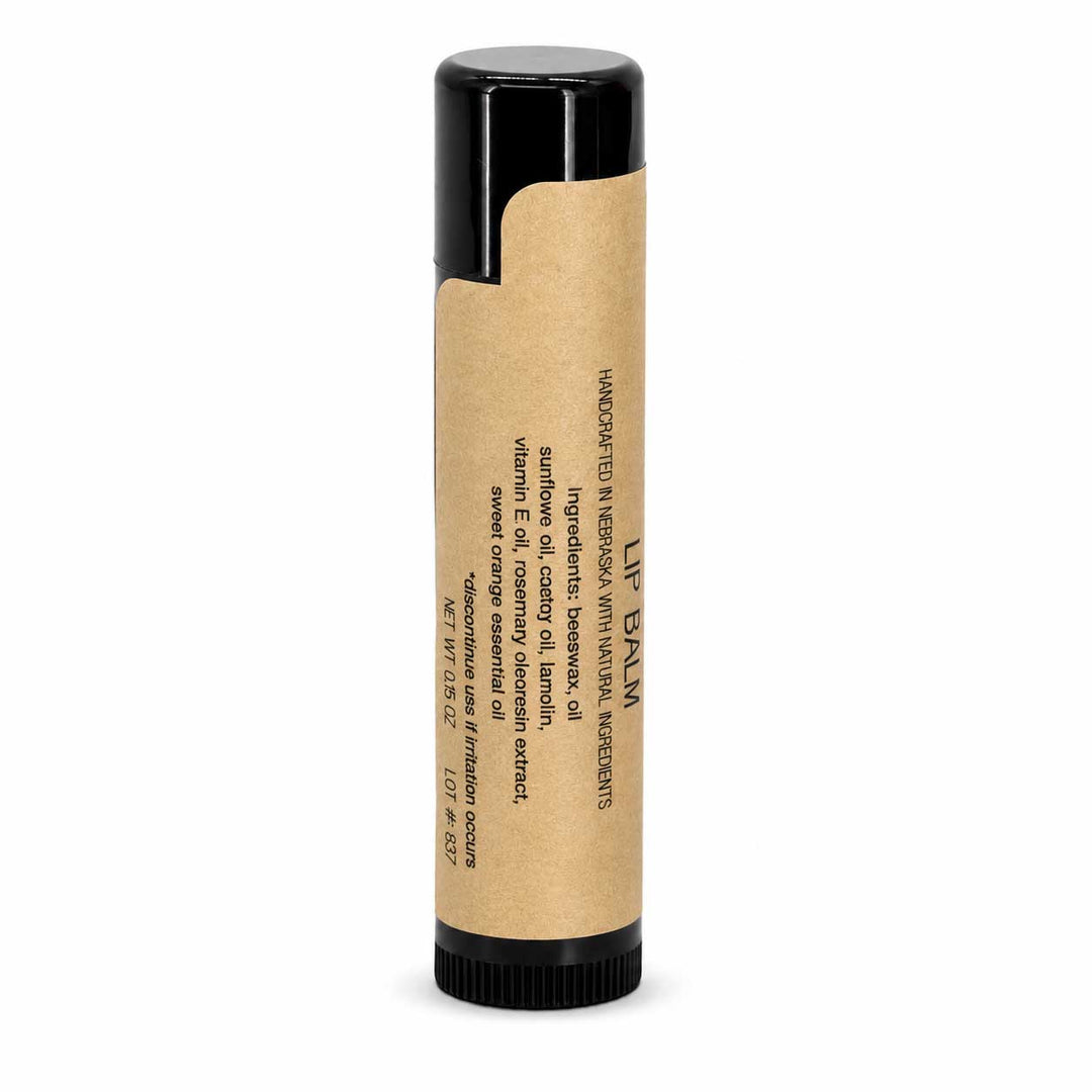 Lip balm with a cardboard container on a white background