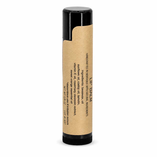 Lip balm with a cardboard container on a white background