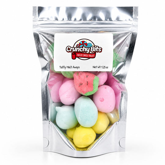 Packaged treats with colorful taffy meltaways and 'Crunchy Bits' branding.