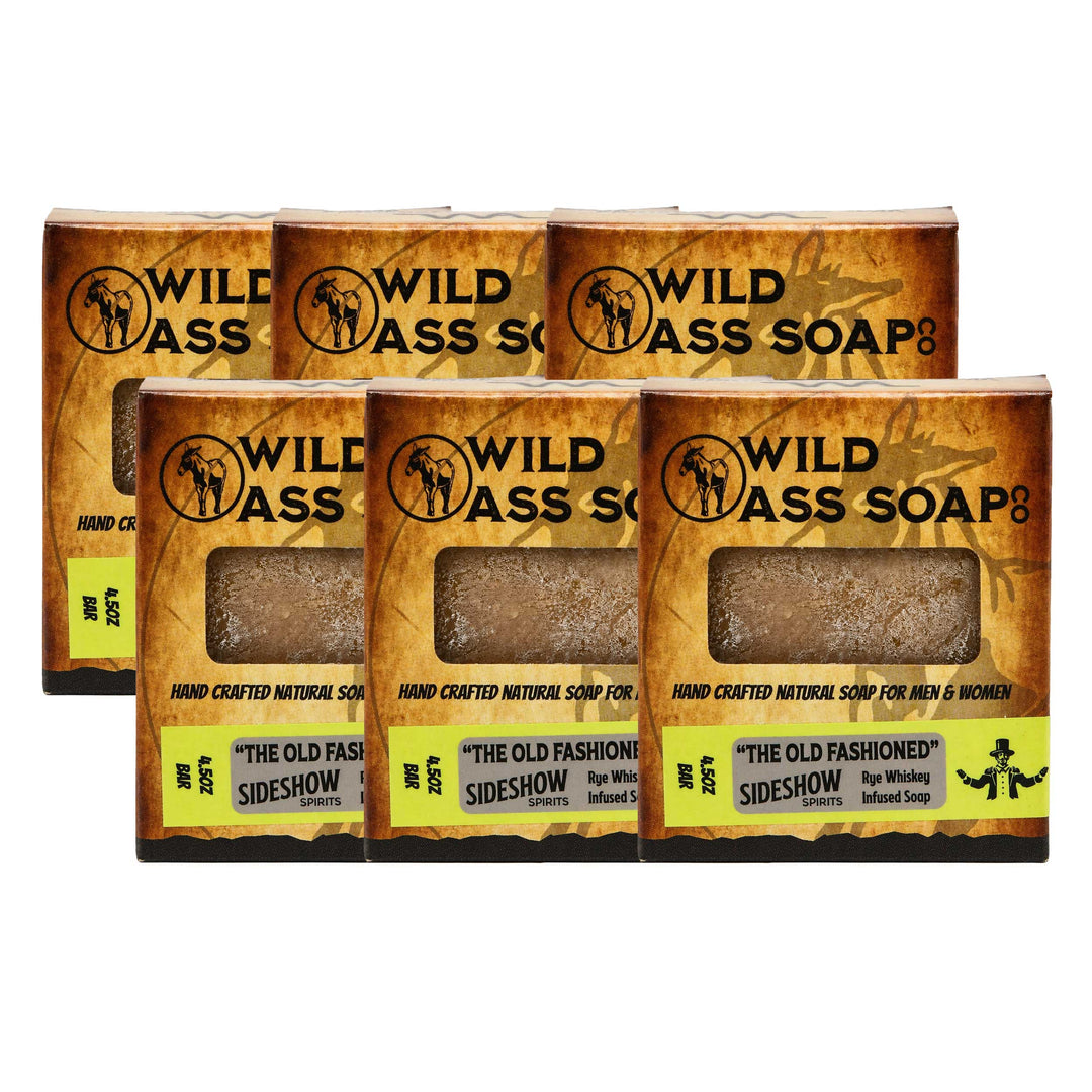 Pack of 6 of Wild Ass Soap with a bar of soap inside, featuring branding and product description.