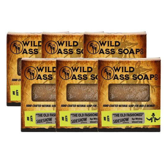 Pack of 6 of Wild Ass Soap with a bar of soap inside, featuring branding and product description.