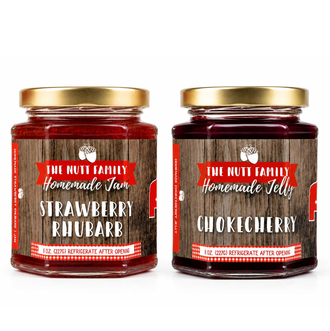 Two jars of homemade jam and jelly with labels on a white background