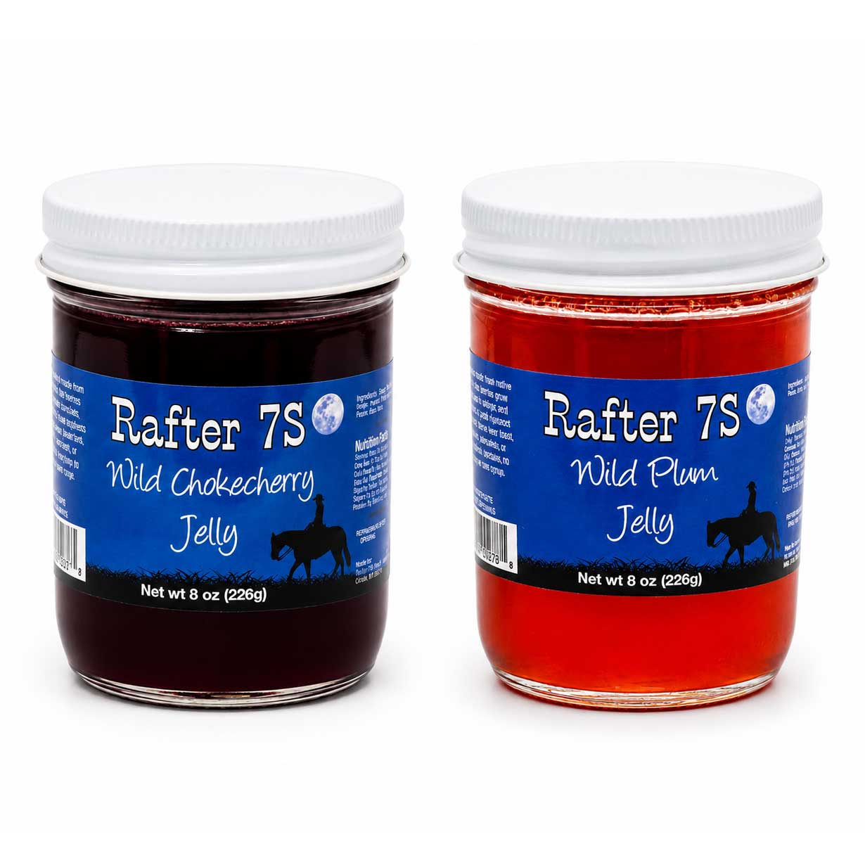 Two jars of Rafter 7S Wild Chokecherry and Wild Plum Jelly side by side on a white background.
