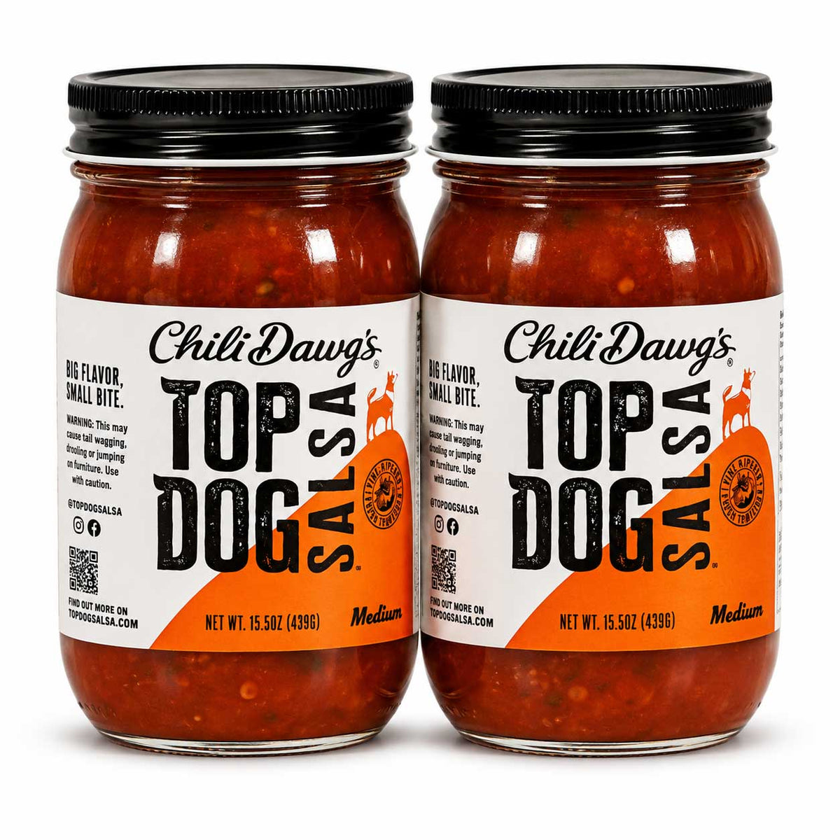 Two glass jars of Chili Dawg's Top Dog Salsa side by side on a white background, featuring white and orange labels with black text and black metal lids.