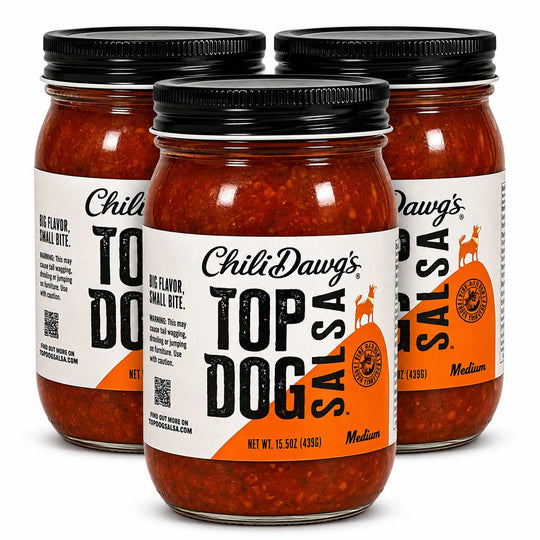 Three glass jars of Chili Dawg's Top Dog Salsa arranged in a studio shot on a white background, with the center jar in front and the side jars slightly behind it.